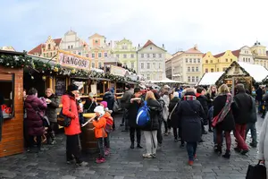 people visiting Prague Christmas markets during the day