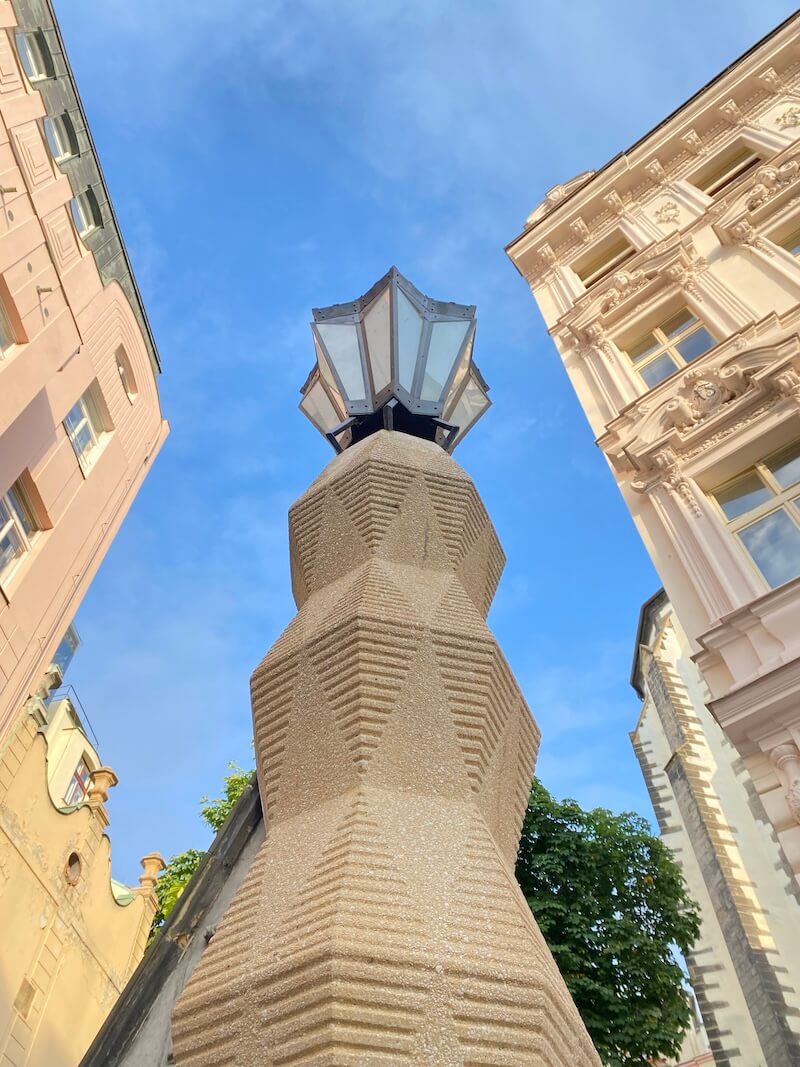 Looking upward at Cubist lamppost in Prague