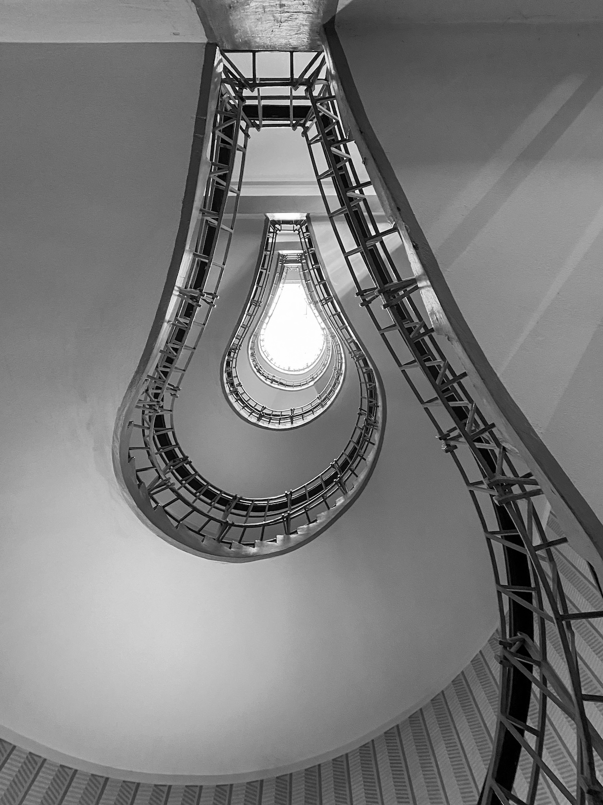 House at the Black Madonna stairwell black and white