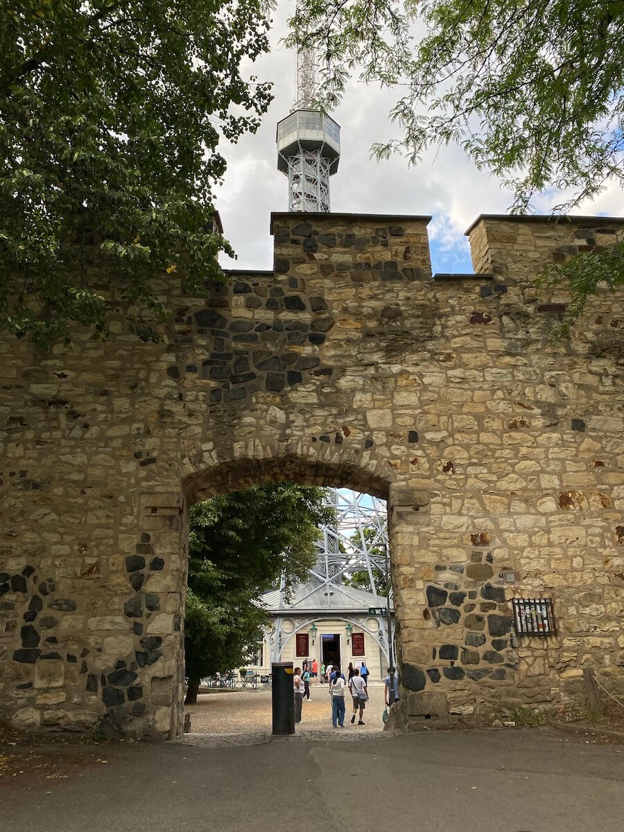 Petrin tower behind Hunger Wall of Prague