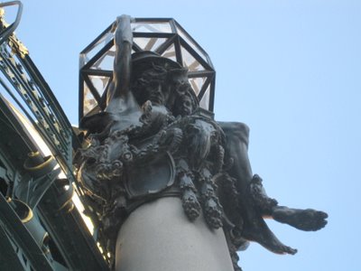 Statue high above the entrance to the Municipal House