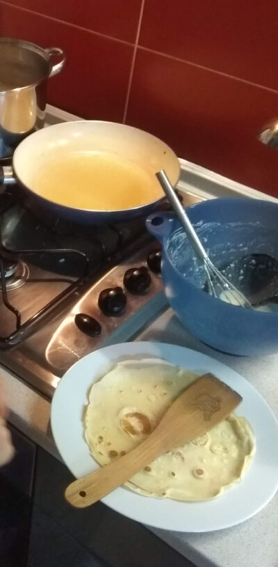 Palacinka on stove with mix Palacinka on stove with mix