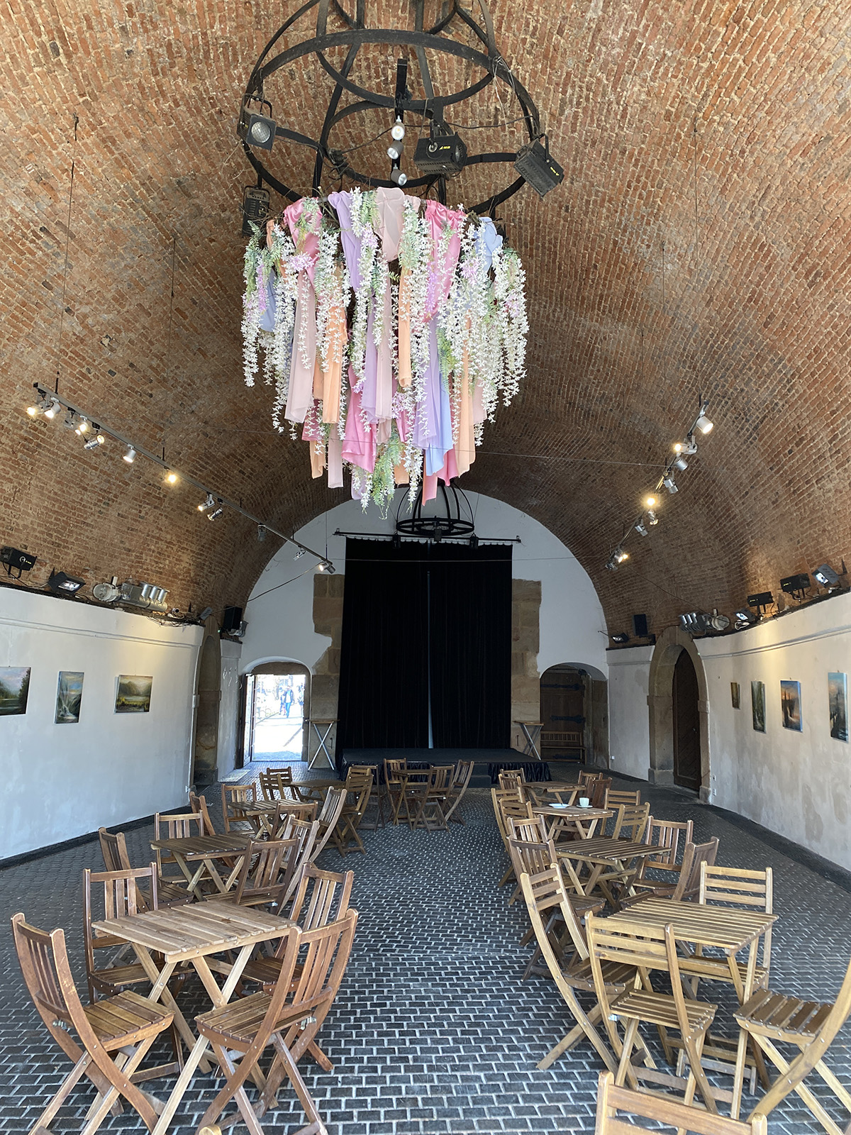 Pisecka brana Prague, interior of gallery with tables