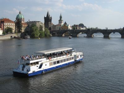 Prague river boat and Charles Bridge