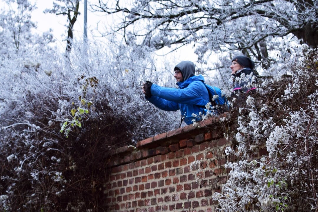 Man in coat in December in Prague