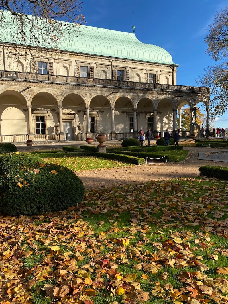 Queen Anne Summer Palace with autumn leaves in garden Queen Anne Summer Palace with autumn leaves in garden