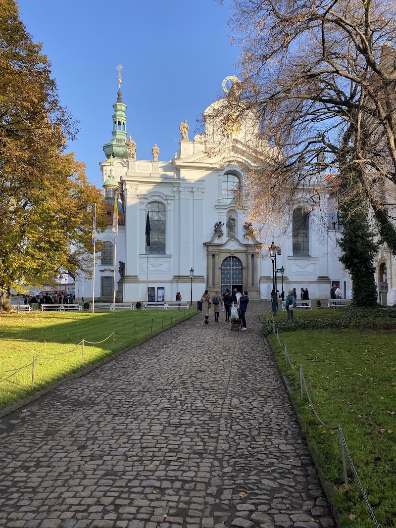 Strahov Basilica with sidewalk leading to it